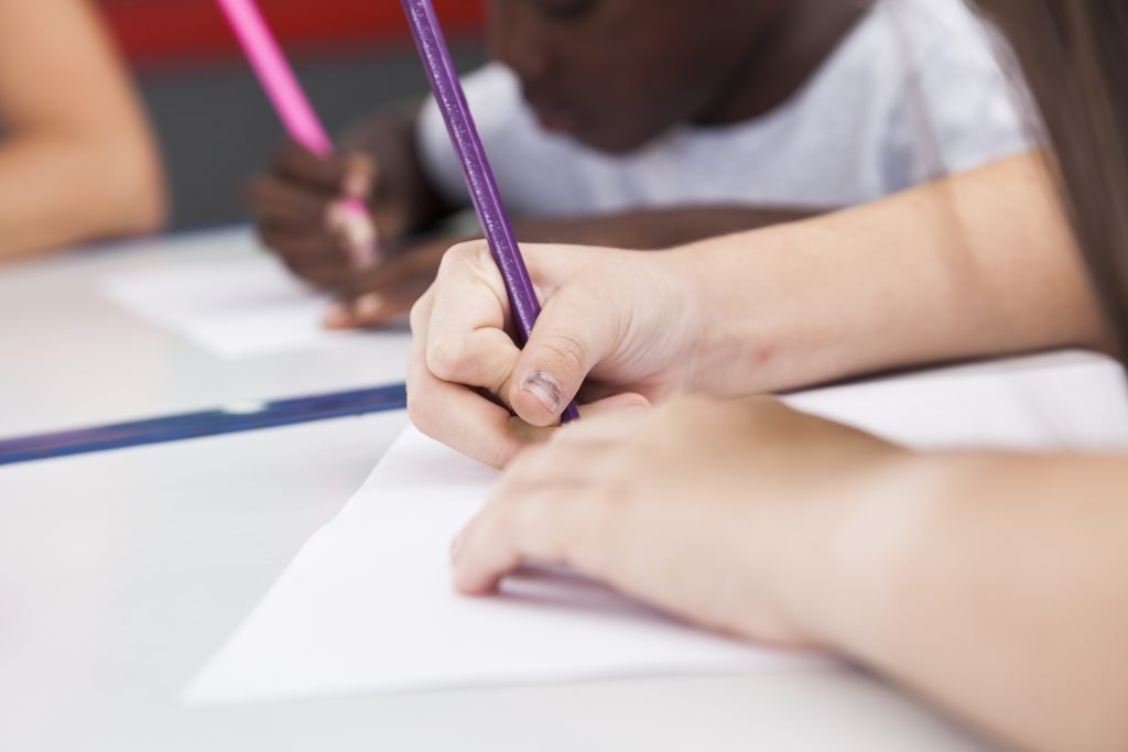 little kid writing