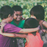 Canva - Four Toddler Forms Circle Photo